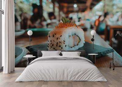   A black sushi paper sits under the sushi bowl and wooden table, with sauce nearby Wall mural