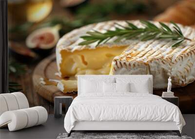   A slice of cheese resting atop a wooden chopping board alongside a knife and wine glass Wall mural