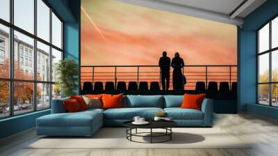 two men watch the sunset Wall mural