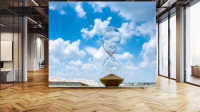 Sand clock with sky and cloud business concept Wall mural