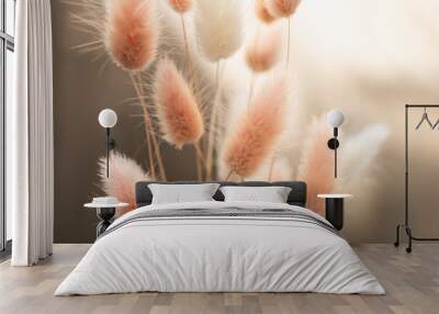 Dry fluffy bunny tails grass on neutral beige background. Tan pom pom plant herbs. Abstract Floral card. Poster. Selective blurred focus. Wall mural