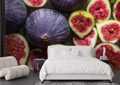 Background of figs. Fresh, juicy ripe fig fruits slices. Wall mural