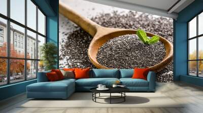 Dry healthy food - omega-3 source - macro of chia seed on wooden spoon Wall mural