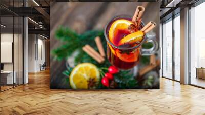 Hot tea or wine with spices, winter drink for christmas Wall mural