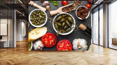 Ingredients for mediterranean food on black background Wall mural