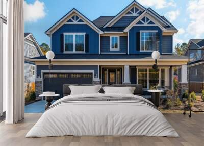 A two-story house with blue siding Wall mural