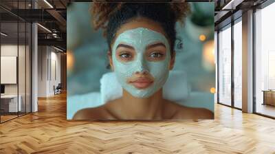 A woman relaxing with a facial mask in a serene spa setting. Wall mural