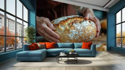 Close-up of Hands Holding Freshly Baked Bread Wall mural