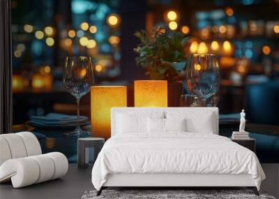 Photo of a round table set for dinner in a modern restaurant. Candles and wine glasses adorn the table, with menu cards at each place setting. Wall mural