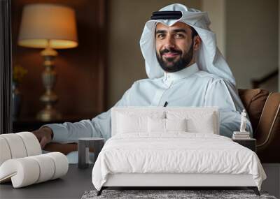 a man in an arabic outfit sitting on a chair in a living room, ceo, corporate portrait, saudi man sitting, Portrait of an attractive arab man.  Wall mural