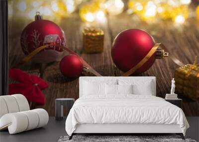 Christmas balls on wooden table Wall mural