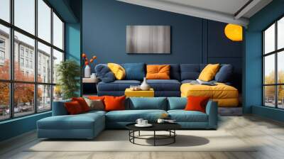 Two knitted poufs near dark blue corner sofa. Scandinavian home interior design of modern living room Wall mural