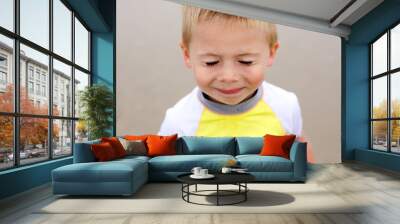 Boy portrait with eyes closed Wall mural