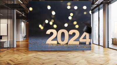 Class of 2024 concept. Number 2024 with graduated cap and bokeh lights banner. Wall mural