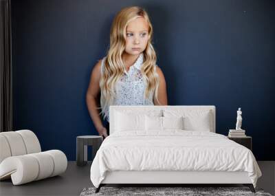 Little fashion girl model posing. Wall mural