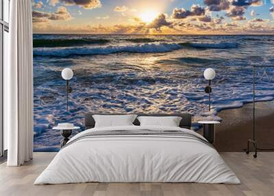 sun rising over the ocean on a Florida beach Wall mural