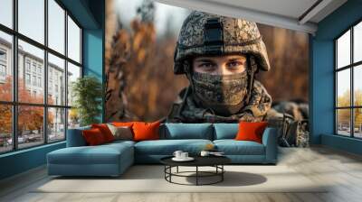 Portrait of soldier with assault rifle in military uniform Wall mural