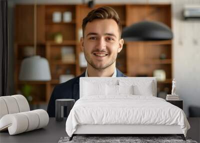 Portrait of young businessman in home office Wall mural