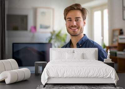 Portrait of young businessman in home office Wall mural