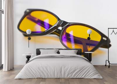 Blue light blocking glasses with yellow lenses and modern trendy style Wall mural