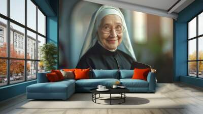 Senior nun with bible book in church on blurred background Wall mural