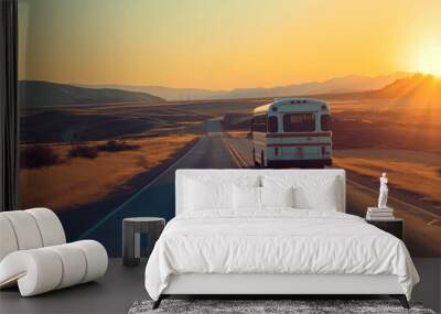 A bus traveling along a highway in the countryside at sunset. Concept of transport, travel by bus. Adventure. Wall mural