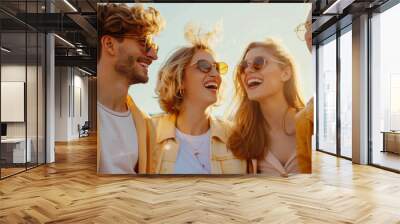 A group of happy friends in casual light clothes are walking on a sunny day. Modern men and women spend time together outdoors. Concept of fun, friendship and walking. Wall mural