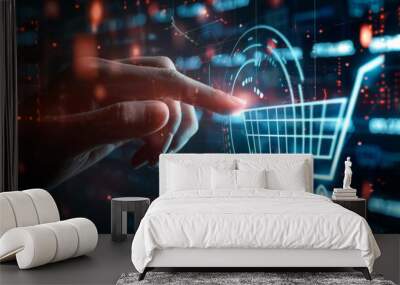 A hand is pointing at a digital shopping cart on a computer screen. Concept of online shopping and the convenience of being able to purchase items from the comfort of one's own home. Wall mural