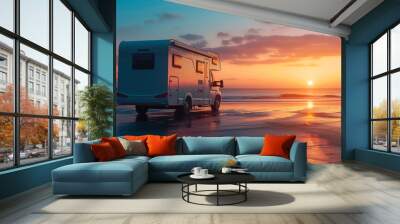 A white camper van is parked on the beach at sunset. The sky is filled with clouds and the sun is setting, creating a beautiful and serene atmosphere Wall mural