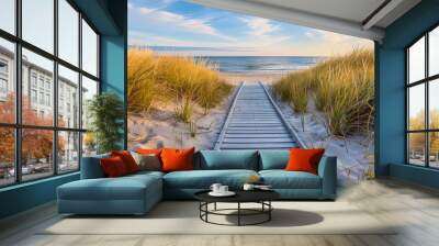 A wooden path leading to the sea with wild grass on either side. Natural landscape. Sea view. Nature concept. Wall mural