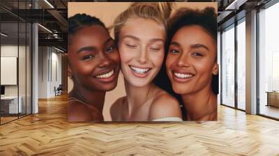 Young multiracial women posing against pastel background. Beautiful models having fun together indoors. The concept of beauty and naturalness. Wall mural