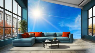 Blue sky. Bright midday sun illuminates the space. Wide photo . Wall mural