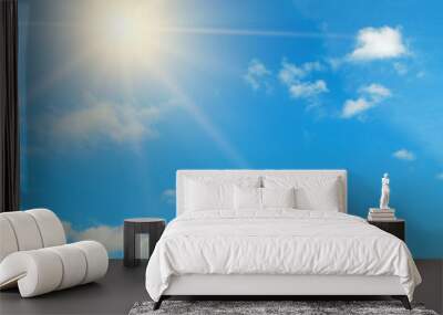 Bright midday sun in the blue sky. Wall mural