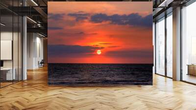 Dark sunset over the ocean. Wide photo . Wall mural