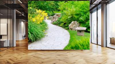 Summer park with paths and flowers. Wide photo. Wall mural