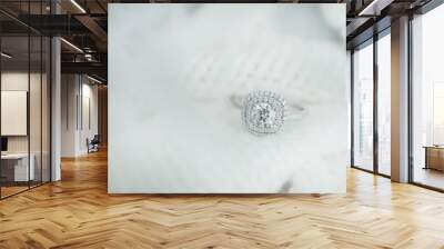 Close up diamond ring on white scarf background with vintage tone.(soft and selective focus) Wall mural