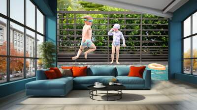 Kids in swimming pool Wall mural