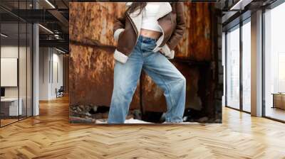 Young woman wearing casual fashion on the street Wall mural