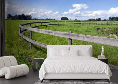 Pasture with a wooden fence Wall mural