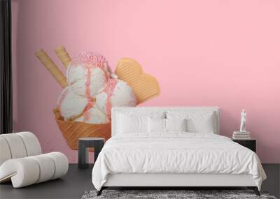 cone with scoops of ice cream strewed sprinkles and poured with glaze on pink background Wall mural