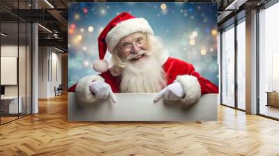 Smiling Santa Claus pointing on blank advertisement banner background with copy space Wall mural