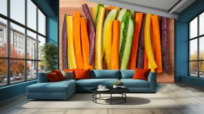 top view of colorful carrots and cucumbers vegetables julienned for snack on wooden board, concept of vegetarian appetizer Wall mural