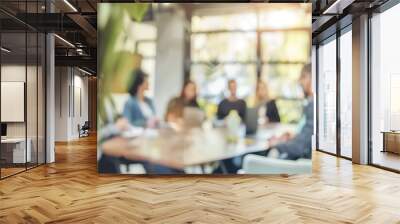 Defocused people at business meeting Panoramic shot of business team at the meeting working on project, purposely blurred with a lens. Wall mural