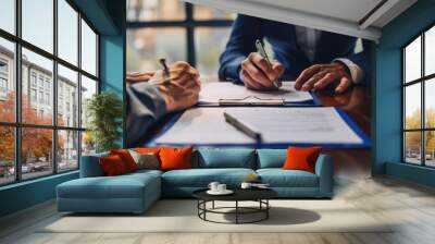 man signing a lease agreement on a meeting with his agent Wall mural