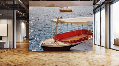 Boats in the bay of Kotor at sunset, Perast, Montenegro. Beautiful seascape in Montenegro. Wall mural