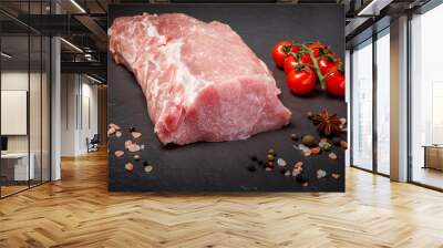 big piece of raw meat served with spices and tomatoes cherry Wall mural