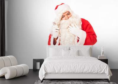 santa claus on white background using smart technology Wall mural