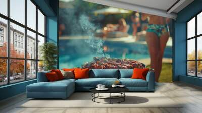 Lifestyle photo of friends having an outdoor barbecue in the backyard with a pool party background. A woman is grilling meat on a grill barbecue at home during summer vacation. Wall mural