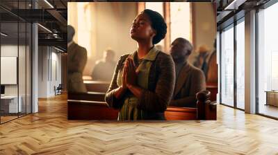 african - american man praying in church. religion, faith, spirituality, religion, god. religion, spirituality, spirituality, faith and god. Wall mural