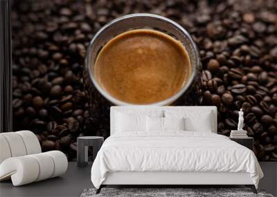 Coffee cup and coffee beans on a dark background. Close up. Wall mural